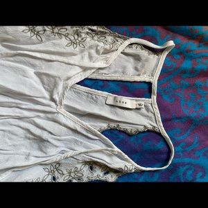 Light off white blouse with decorative stitching